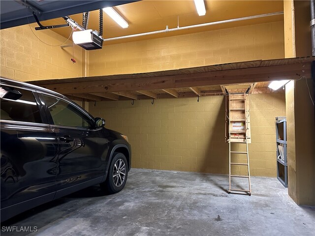 garage featuring a garage door opener