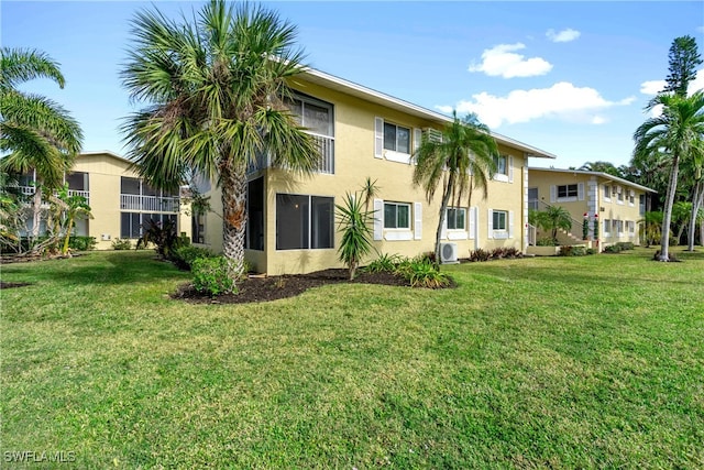 exterior space with a lawn