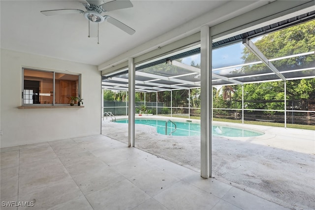 view of pool featuring ceiling fan