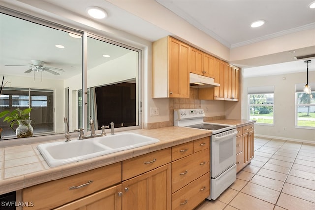 kitchen with light tile patterned flooring, sink, tile countertops, ceiling fan, and white electric range