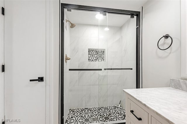 bathroom featuring vanity and walk in shower