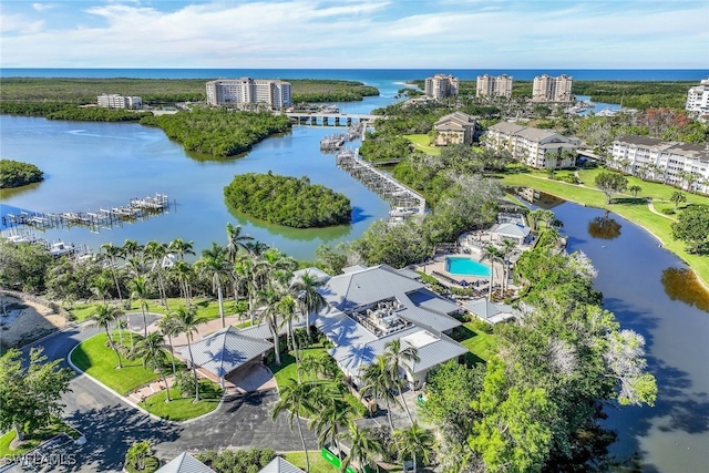 birds eye view of property featuring a water view