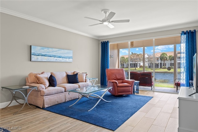 living room featuring light hardwood / wood-style floors, crown molding, and ceiling fan