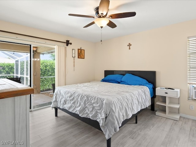 bedroom featuring access to exterior, light wood-type flooring, and ceiling fan