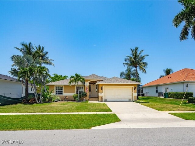 160 Kirkwood St, Marco Island, FL 34145 - ranch-style house featuring an attached garage, a front lawn, stucco siding, and concrete driveway