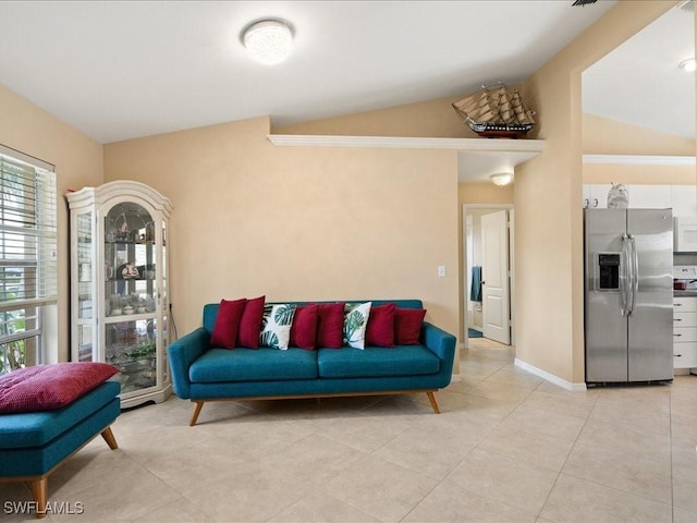 160 Kirkwood St, Marco Island, FL 34145 - living room with light tile patterned floors and lofted ceiling