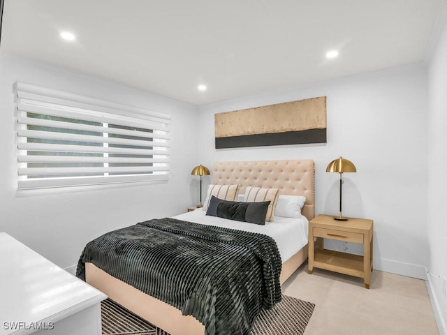 bedroom featuring recessed lighting and baseboards