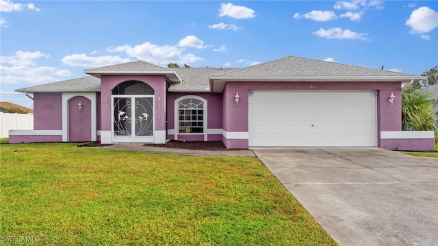 ranch-style home with a front yard and a garage