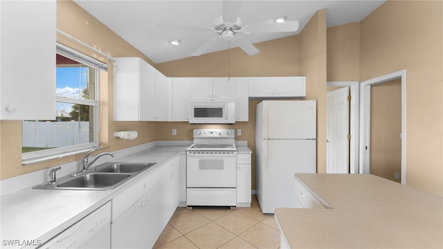 kitchen featuring sink, light tile patterned floors, white cabinets, white appliances, and ceiling fan