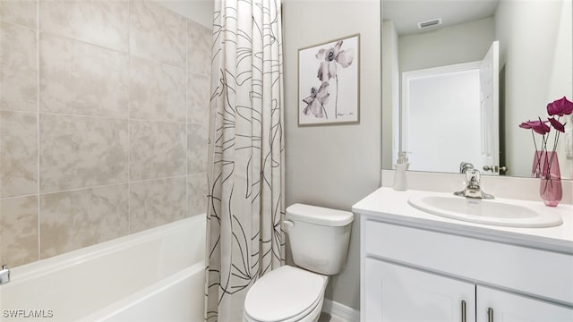 bathroom featuring visible vents, toilet, shower / bathtub combination with curtain, and vanity