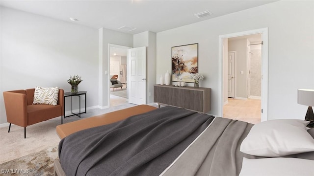 bedroom featuring baseboards, visible vents, and light colored carpet