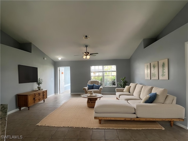 living room with tile patterned floors, ceiling fan, and high vaulted ceiling