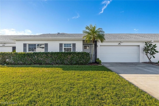 single story home with a garage, stucco siding, driveway, and a front yard