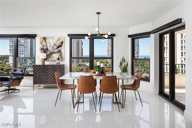 dining space featuring a chandelier