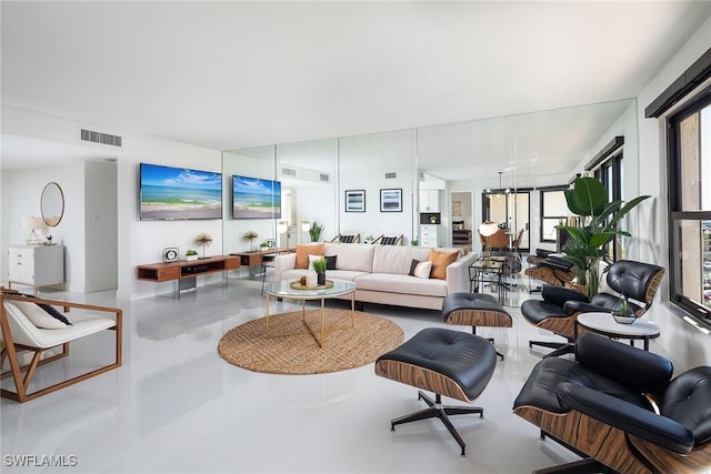 living room with a chandelier