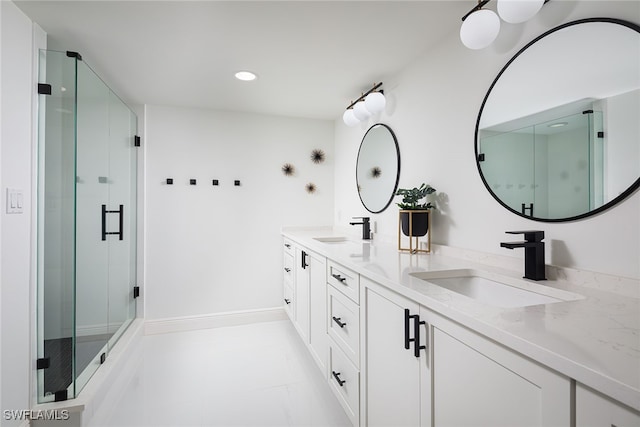 bathroom with vanity and an enclosed shower