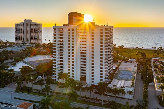 outdoor building at dusk with a water view