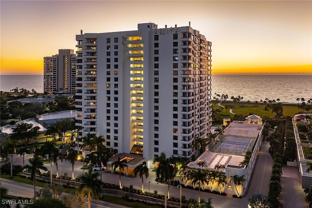 outdoor building at dusk with a water view