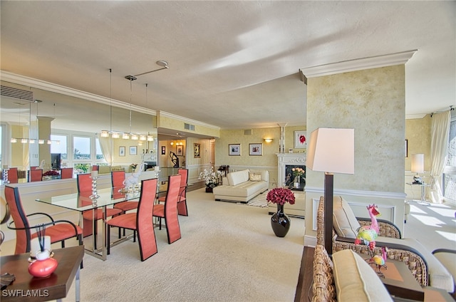 carpeted dining space with crown molding and a textured ceiling