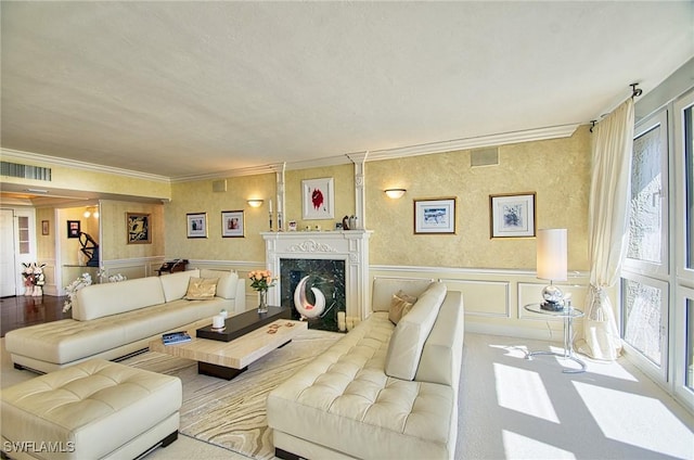 4031 Gulf Shore Blvd N Unit 8E, Naples, FL 34103 - carpeted living area featuring visible vents, crown molding, a decorative wall, and a healthy amount of sunlight