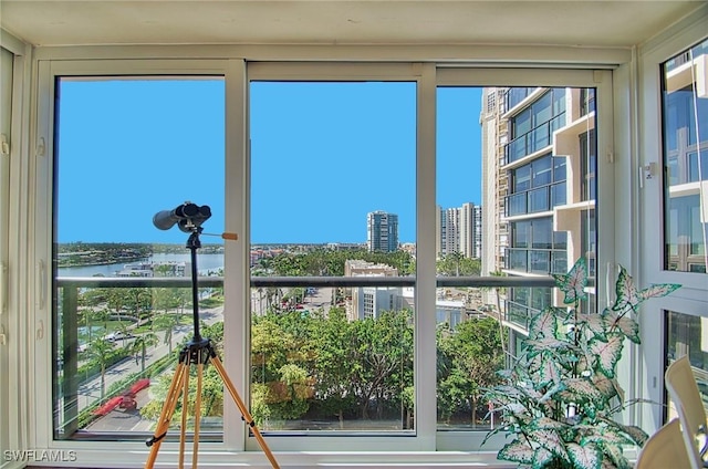 4031 Gulf Shore Blvd N Unit 8E, Naples, FL 34103 - unfurnished sunroom featuring a city view