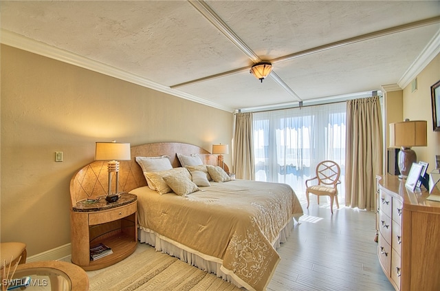 bedroom featuring crown molding, light hardwood / wood-style flooring, and ceiling fan