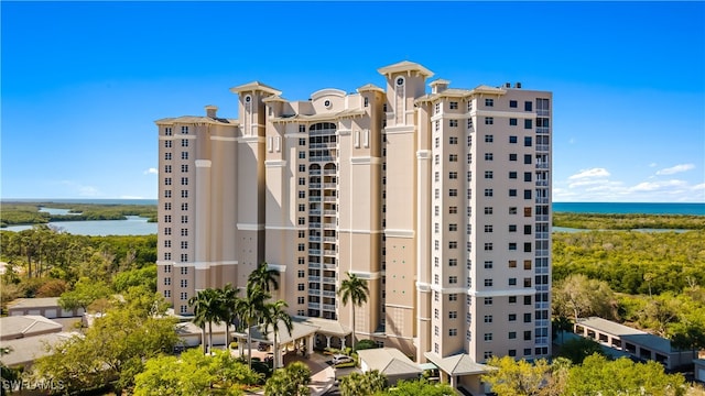 view of building exterior featuring a water view