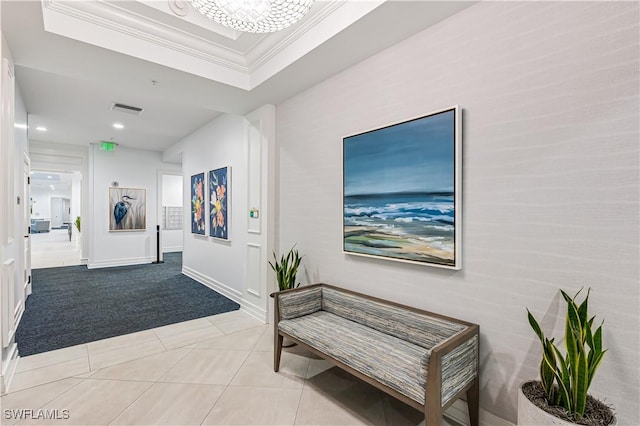 corridor with visible vents, light carpet, recessed lighting, a tray ceiling, and light tile patterned floors
