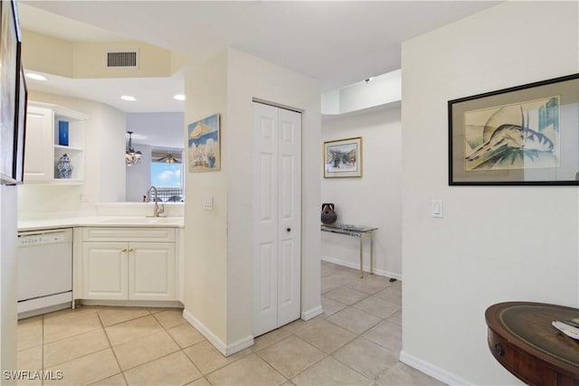 interior space with vanity and tile patterned flooring