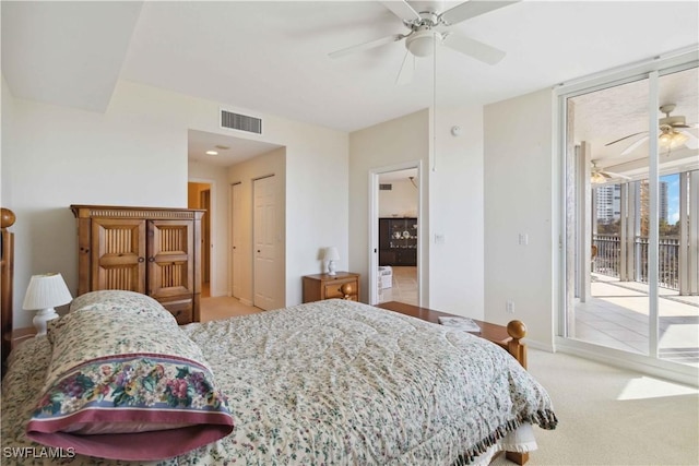 carpeted bedroom with a closet, ceiling fan, and access to outside