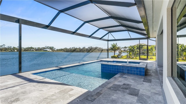 view of swimming pool with a water view, a patio area, and a lanai