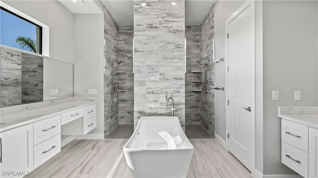 bathroom featuring vanity, hardwood / wood-style floors, and shower with separate bathtub