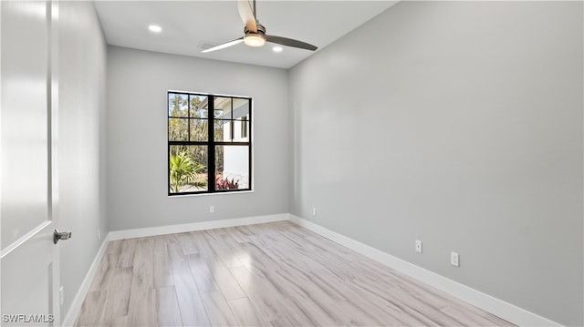 unfurnished room with light wood-type flooring and ceiling fan