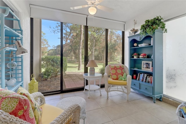 sunroom with ceiling fan and a wealth of natural light