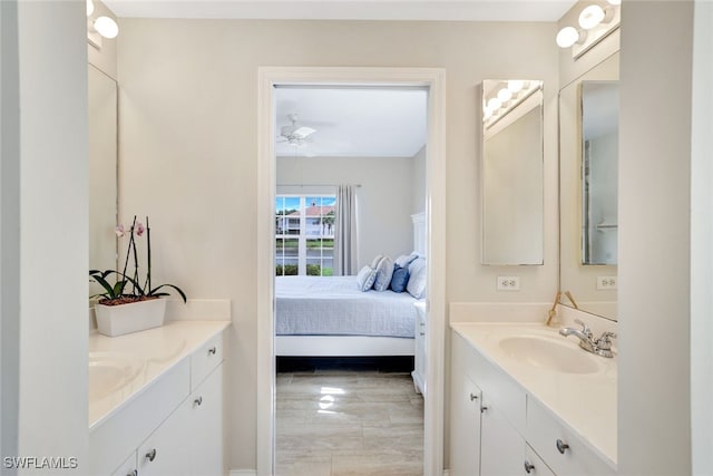 bathroom featuring vanity and ceiling fan