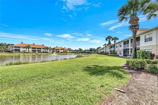 view of yard with a water view