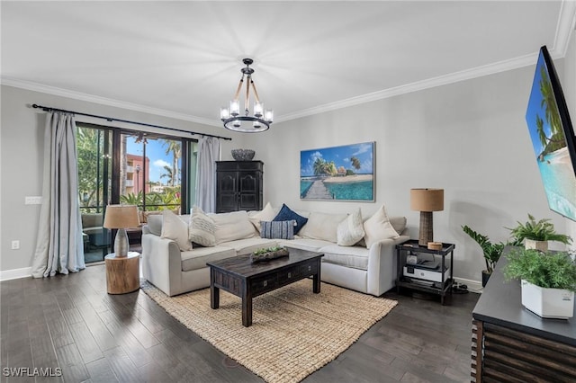 living room featuring crown molding, dark wood-type flooring, and a notable chandelier