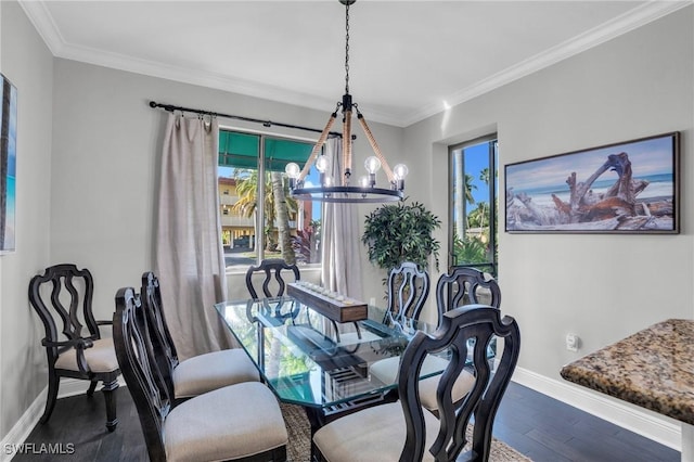 dining space featuring crown molding, a chandelier, dark wood finished floors, and baseboards