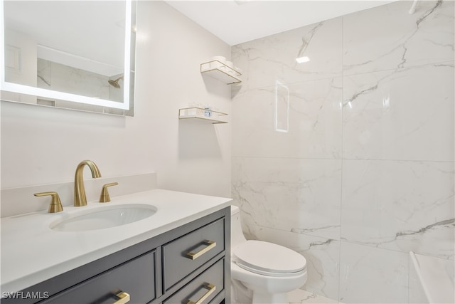 bathroom with vanity and toilet