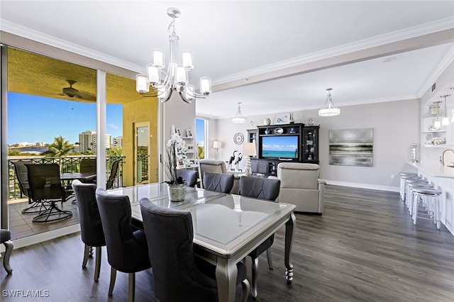 dining room with a notable chandelier, dark wood-style floors, baseboards, and ornamental molding