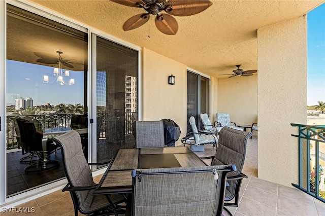 view of patio / terrace featuring a balcony and ceiling fan