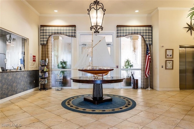 foyer entrance featuring elevator, recessed lighting, baseboards, and ornamental molding