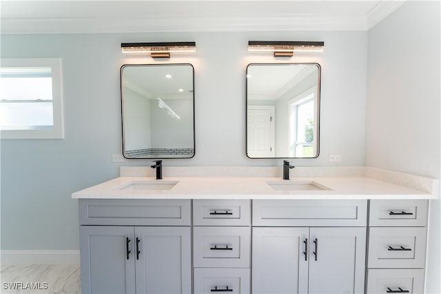 bathroom with vanity and ornamental molding