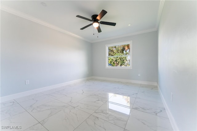 spare room featuring ceiling fan and ornamental molding