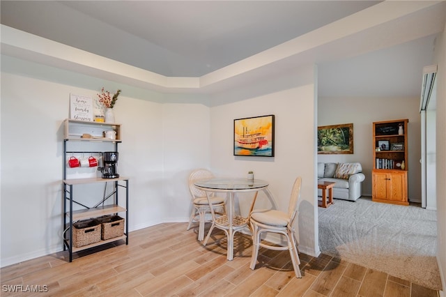 dining space featuring light hardwood / wood-style floors