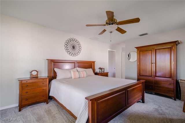 bedroom featuring light carpet and ceiling fan