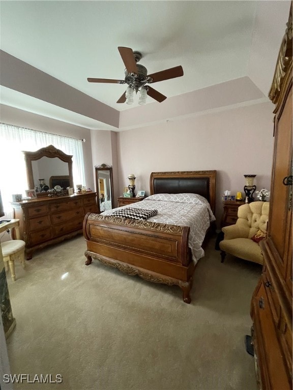 bedroom featuring ceiling fan and carpet flooring