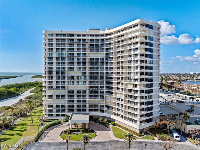 view of property with a water view