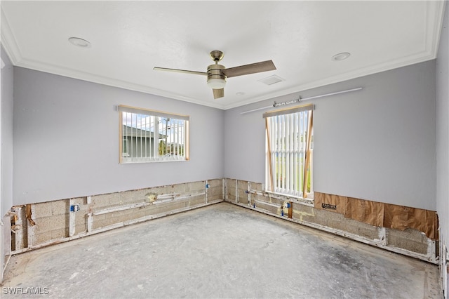 unfurnished room with crown molding and ceiling fan