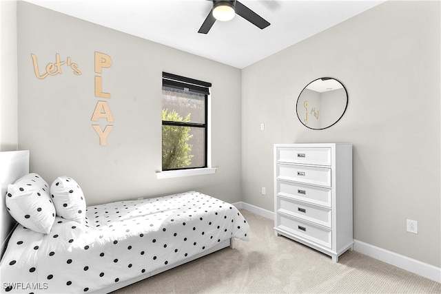 carpeted bedroom featuring ceiling fan